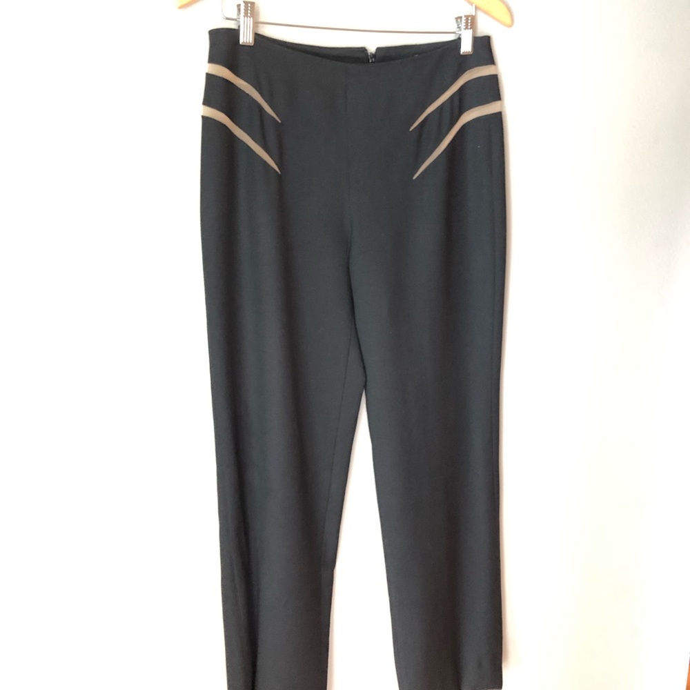 Gianni Versace wide leg pant with hip cut outs.